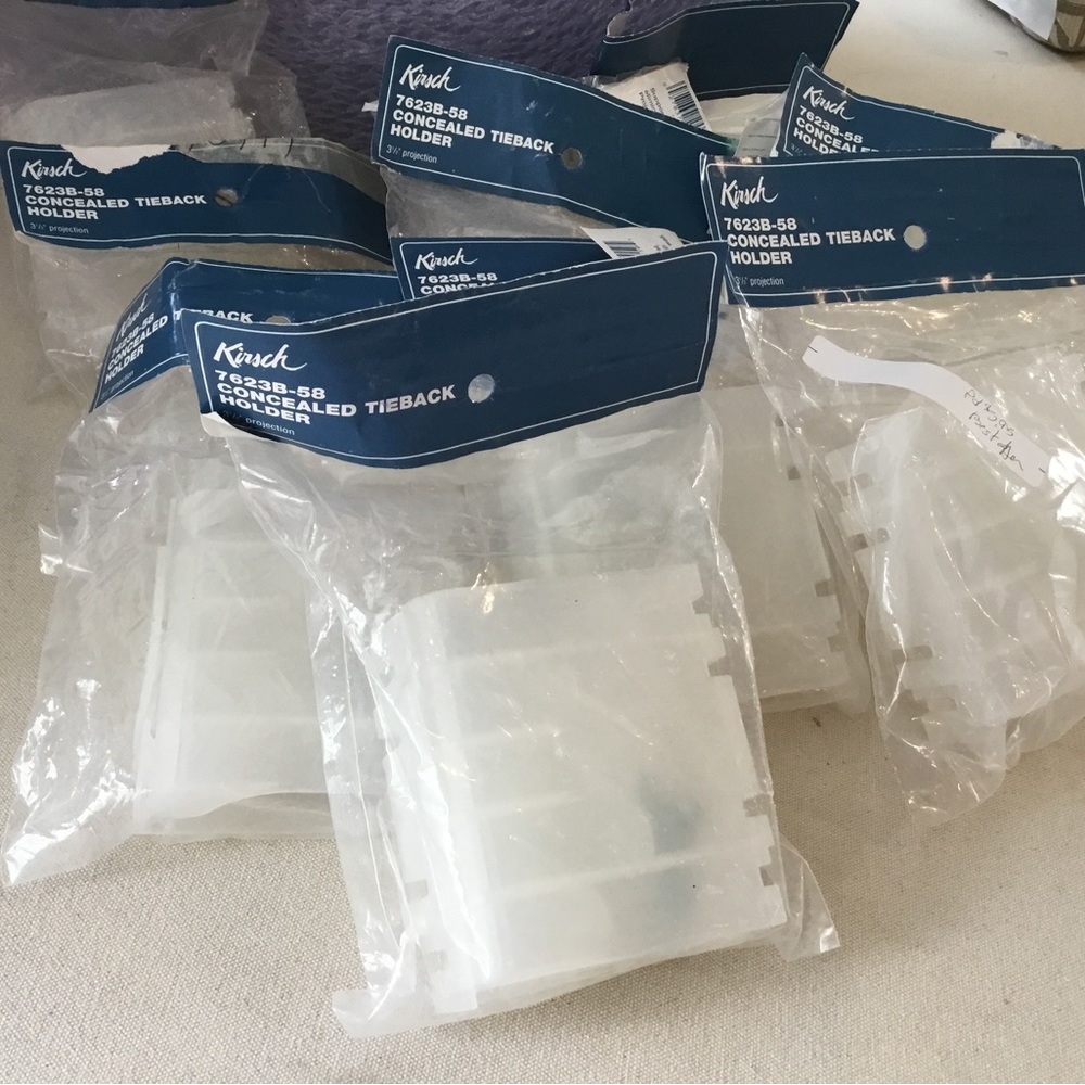 Tiebacks, plastic. Concealed